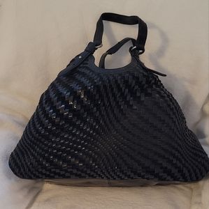 Cole Hann black patent leather and suede weave hand bag